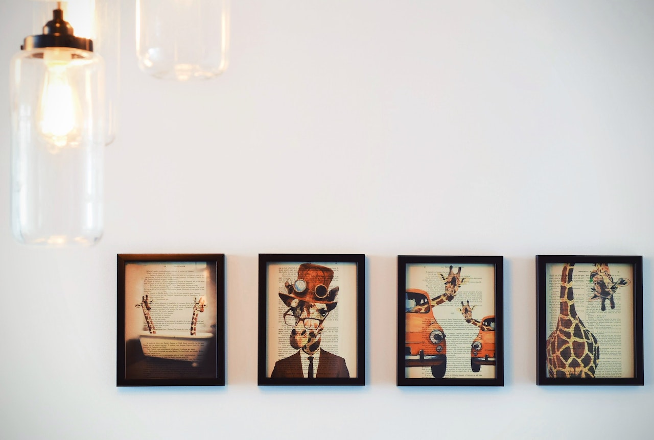white wall with picture frames